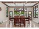 Dining Room with windows and view to backyard pool at 5727 Colorow Dr, Morrison, CO 80465