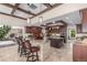 Gourmet kitchen with stainless steel appliances, custom cabinets, granite countertops, and a large island at 5727 Colorow Dr, Morrison, CO 80465