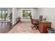 Office features hardwood floor and a beautiful window view of outside landscape at 5727 Colorow Dr, Morrison, CO 80465