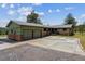 Home with a two-car garage and stone accents at 30651 Hollings Way, Golden, CO 80403