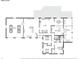 Detailed floor plan showcasing the layout of the main floor, including bedrooms, living spaces, and garage at 30651 Hollings Way, Golden, CO 80403