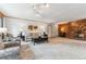 Living room with a brick fireplace and a large sofa at 30651 Hollings Way, Golden, CO 80403
