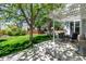Lush backyard with pergola covered patio and playground at 10765 Fremont Dr, Parker, CO 80134