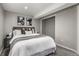 Basement bedroom features neutral walls, carpet floor, and egress window at 10765 Fremont Dr, Parker, CO 80134