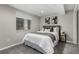 Basement bedroom features neutral walls, carpet floor, and egress window at 10765 Fremont Dr, Parker, CO 80134