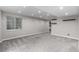 Spacious finished basement with neutral walls, gray carpet, and recessed lighting at 10765 Fremont Dr, Parker, CO 80134