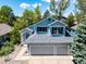 Charming two-story home featuring a three-car garage and well-maintained landscaping at 10765 Fremont Dr, Parker, CO 80134