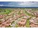 Expansive aerial view of this neighborhood offering well-maintained homes, landscaping and green space at 9538 Pendio Ct, Highlands Ranch, CO 80126