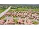 Aerial view of this neighborhood with tree-lined streets and well maintained sidewalks and green space at 9538 Pendio Ct, Highlands Ranch, CO 80126