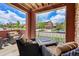 Relaxing outdoor patio boasts comfortable seating and neighborhood views at 9538 Pendio Ct, Highlands Ranch, CO 80126