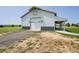 Barn featuring ample parking in front of the building, ideal for storage at 56920 E 42Nd Ct, Strasburg, CO 80136