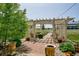 Beautiful pergola with brick patio and outdoor seating, ideal for relaxing and entertaining at 56920 E 42Nd Ct, Strasburg, CO 80136