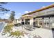 Backyard patio with seating area and partial view of house at 14800 Foothill Rd, Golden, CO 80401