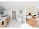 Elegant bathroom with freestanding tub, double vanity and bedroom view at 14800 Foothill Rd, Golden, CO 80401