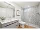 Spa-like bathroom with terrazzo shower and floating vanity at 14800 Foothill Rd, Golden, CO 80401