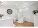 Clean bathroom with white subway tile and bathtub at 14800 Foothill Rd, Golden, CO 80401