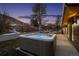 Relaxing hot tub on patio with hill side views at 14800 Foothill Rd, Golden, CO 80401