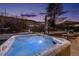 Hot tub at night with blue lighting, mountain views at 14800 Foothill Rd, Golden, CO 80401