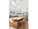 Modern kitchen island with white countertop and four light brown stools at 14800 Foothill Rd, Golden, CO 80401