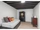 Cozy basement bedroom with soft lighting and modern furnishings at 5332 S Lisbon Way, Centennial, CO 80015