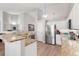 Bright kitchen featuring granite countertops, stainless steel appliances and ample cabinet space at 5332 S Lisbon Way, Centennial, CO 80015