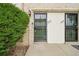 Inviting front entrance featuring security doors, brick accents, and easy access at 6376 E Mississippi Ave, Denver, CO 80224