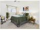 Well-lit bedroom featuring modern design and a comfortable space at 7205 S Gaylord St # G, Centennial, CO 80122