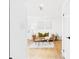 Bright living room featuring a leather sofa, wood floors, and modern decor at 7205 S Gaylord St # G, Centennial, CO 80122