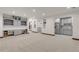 Spacious basement with custom built-ins and cabinetry, offering a versatile living and entertainment area with plenty of storage at 1525 W 141St Way, Westminster, CO 80023