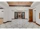 Dining room with marble floors, chandelier and access to the outdoor stone fireplace at 1525 W 141St Way, Westminster, CO 80023