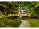 Beautiful home featuring an artful stone exterior, manicured lawn, and inviting entrance at 1525 W 141St Way, Westminster, CO 80023