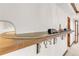 Unique hallway design with track-mounted toy train and a custom track, plus decorative iron supports at 1525 W 141St Way, Westminster, CO 80023