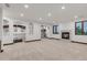 Expansive living room with fireplace and detailed wrought iron work, offering a comfortable and elegant space for relaxation and entertainment at 1525 W 141St Way, Westminster, CO 80023
