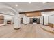 Open concept living room with brick accents and access to outside, ideal for entertaining and enjoying indoor-outdoor living at 1525 W 141St Way, Westminster, CO 80023