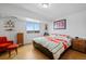 Relaxing bedroom with a king-size bed and cityscape window view at 800 N Washington St # 710, Denver, CO 80203