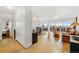 Open living room with hardwood floors and large windows at 800 N Washington St # 710, Denver, CO 80203