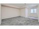 Finished basement with neutral carpet and a window for natural light at 222 S Monroe St, Denver, CO 80209