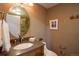 Charming bathroom with stylish vanity, oval mirror, walk-in shower, and neutral wall color at 222 S Monroe St, Denver, CO 80209