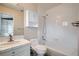 Neat bathroom with a shower-tub combo and a vanity sink for a clean aesthetic at 222 S Monroe St, Denver, CO 80209