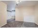 Neutral bedroom featuring gray carpet, ample closet space and natural light from the window at 222 S Monroe St, Denver, CO 80209