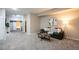 Spacious open living area with a comfortable sofa, stylish coffee table, and access to other parts of the house at 222 S Monroe St, Denver, CO 80209