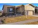 Lovely home with a well-maintained lawn and inviting curb appeal at 22046 E Allenspark Pl, Aurora, CO 80016