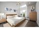 Bright bedroom with high ceilings, large windows, and contemporary furnishings, creating a relaxing space at 2957 Osceola St, Denver, CO 80212