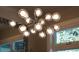 Modern chandelier with decorative glass globes creates a bright focal point at 2957 Osceola St, Denver, CO 80212