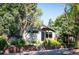 Charming single-story home with modern design and well-maintained front yard landscaping at 2957 Osceola St, Denver, CO 80212