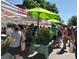 Bustling farmer's market scene with vibrant displays of fresh produce and local vendors at 2957 Osceola St, Denver, CO 80212