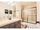 Modern bathroom with a shower-tub combo and a sleek single sink vanity at 5316 Stuart St, Denver, CO 80212