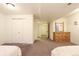 Spacious bedroom featuring a large closet and a wooden dresser with a mirror at 5316 Stuart St, Denver, CO 80212