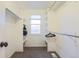 Organized walk-in closet with built-in shelving, rod for hangers, neutral walls, and ample storage space at 5316 Stuart St, Denver, CO 80212