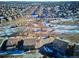 Aerial view of homes and a park-like green space at 10298 Tall Oaks Cir, Parker, CO 80134